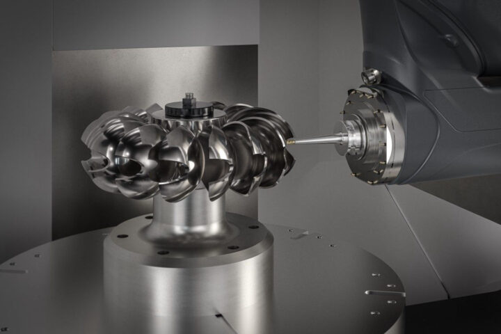 An automated 5-axis CNC machining cell with robotic part handling and AI monitoring systems.