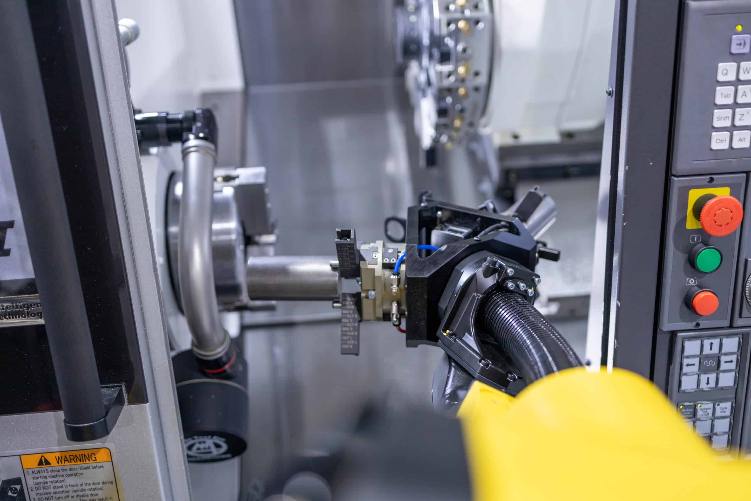 Automated milling machine cell operating in a Midwest manufacturing workforce crisis.