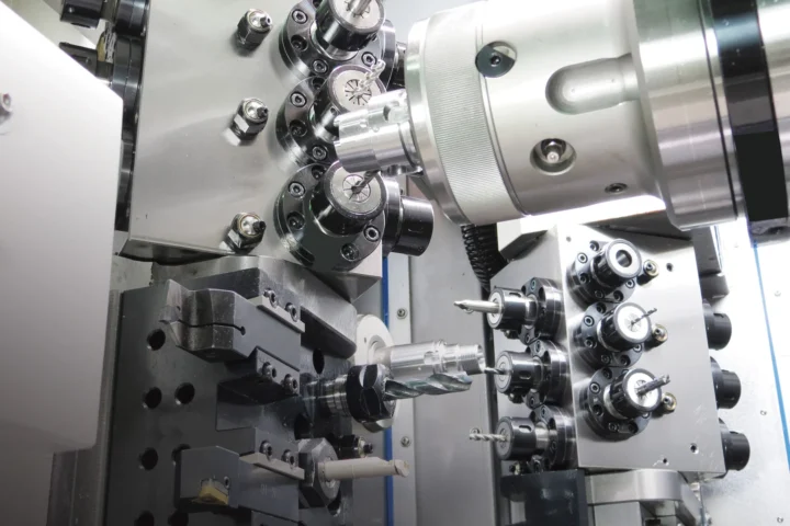 CNC milling center operating in an unmanned, lights out machining cell for overnight production.