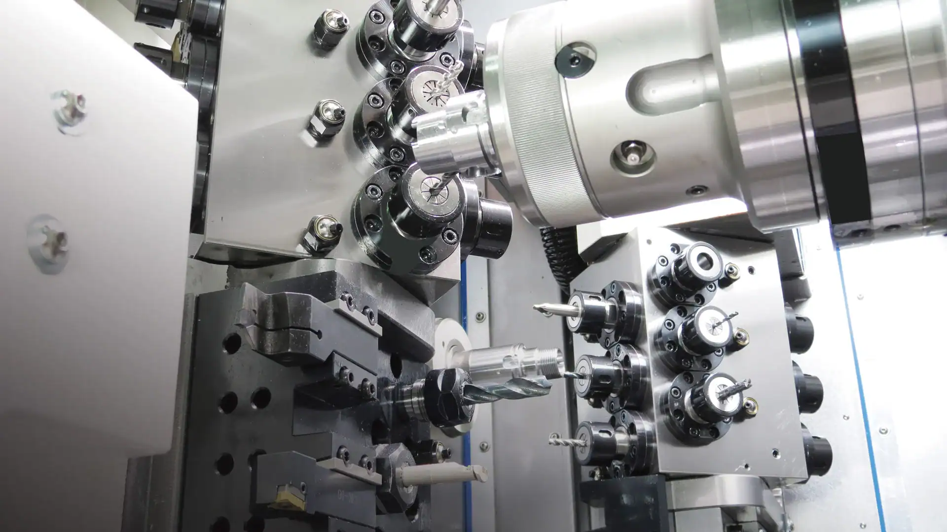 CNC milling center operating in an unmanned, lights out machining cell for overnight production.